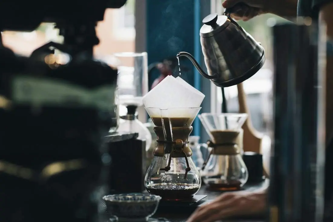 Espresso being poured at a coffee bar